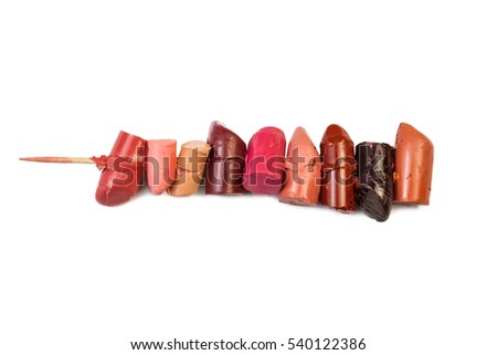 multi-colored lipsticks for a professional make-up in a row.