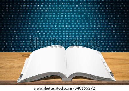 Open book on wooden table with abstract blue technology background.