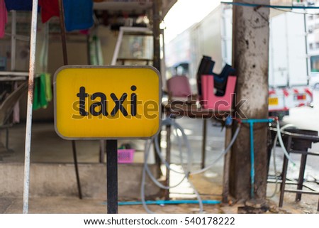 taxi symbol taxi sign near wayside in thailand