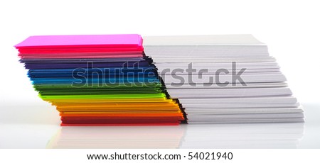 Colored and white paper stack isolated on white background