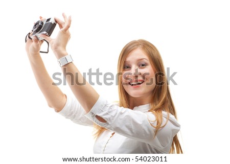 The beautiful Girl with the camera on a white background