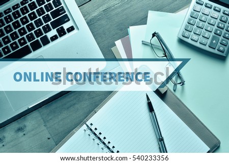 Notebook and Laptop with graph and charts. Online Education Concept with word Online Conference