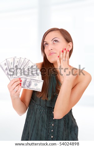 picture of happy woman with money over abstract background