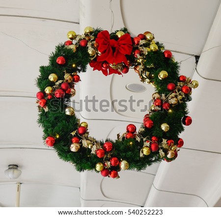 Christmas wreath for decorations on the train. Christmas background, new year, winter holiday.
