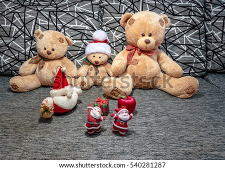 Families bear watching Santa Claus dancing.