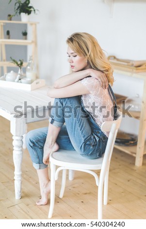young girl in denim clothes in the morning