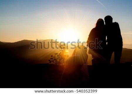 Tourists and photographers with beautiful sunrise on mountain in the northeast of Thailand.
