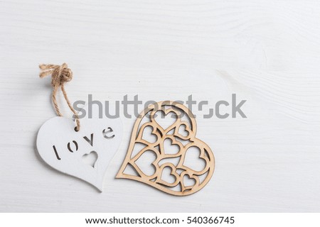 Hearts on white wooden background top view with copy space. Concept of Valentine's Days holiday