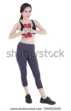 portrait of a young pretty woman holding weights and doing fitness against a white background. asia