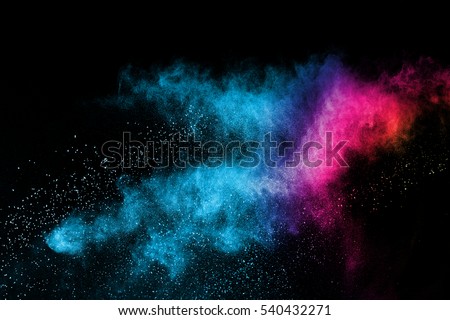 Multicolor powder explosion on black background. Colored cloud. Colorful dust explode. Paint Holi. Royalty-Free Stock Photo #540432271
