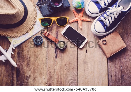 Travel accessories costumes. Passports, luggage, The cost of travel maps prepared for the trip Royalty-Free Stock Photo #540433786