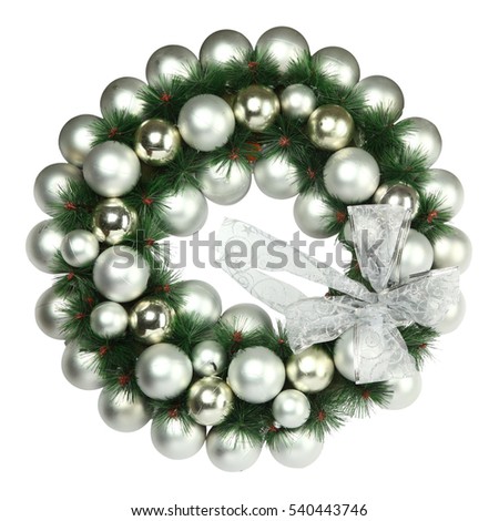 Christmas wreath formed by silver balls, and silver bow