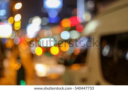 Night city van car and tower street lights bokeh background