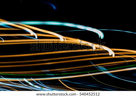 Abstract night lights lines motion background,Abstract blur messy light trail.