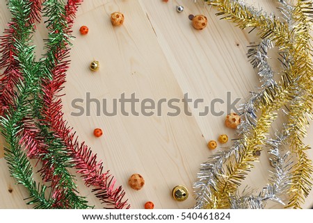 Decoration for happy new year on brown wooden background, flat lay.