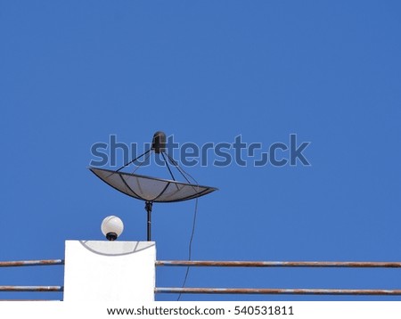 Satellite Dish with blue sky background