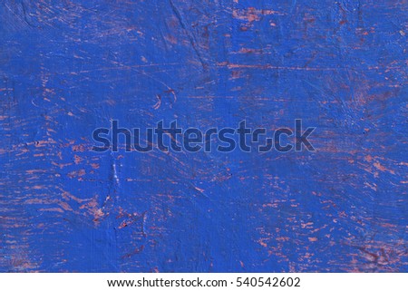 Scratches on blue and red colors abstract art background. Rough brushstrokes.