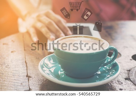 Abstract concept image of Good morning sunrise with a woman with hot coffee in cafe and use a mobile phone playing social network and shopping online on app smartphone