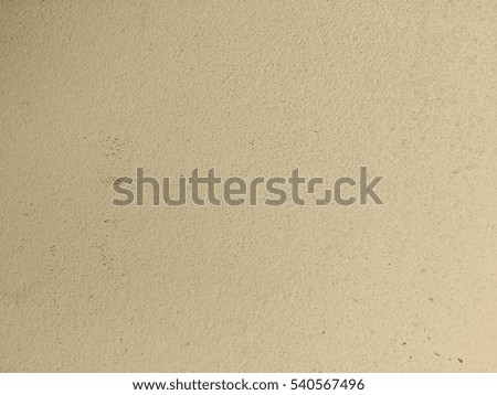 Vintage yellow concrete wall texture background 