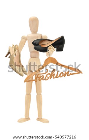 Fashion Hanger Ladies Shoes held by Wood Mannequin isolated on white background