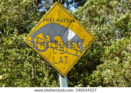 Roadsign precaution coatis