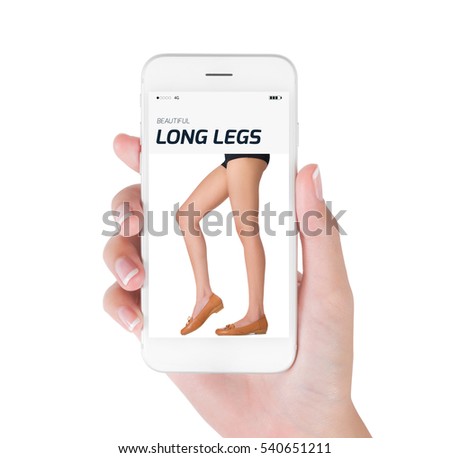 Woman using smart phone searching beautiful long legs posing and wearing a new trendy brown leather shoes, fashion of profile view, Fashion and accessories concept, isolated white background.