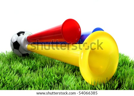 colorful football hooter on a piece of grass Royalty-Free Stock Photo #54066385