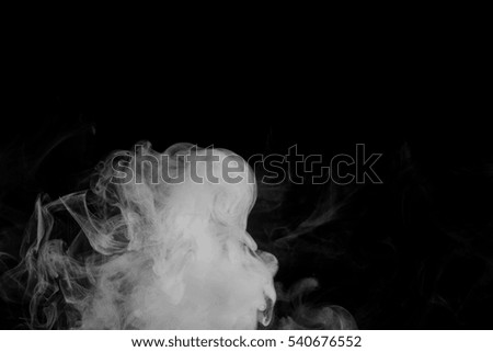 Abstract smoke Weipa. Personal vaporizers fragrant steam. The concept of alternative non-nicotine smoking. White smoke on a black background. E-cigarette. Evaporator. Taking Close-up. Vaping.