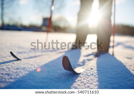 Skiing in snowdrift Royalty-Free Stock Photo #540711610
