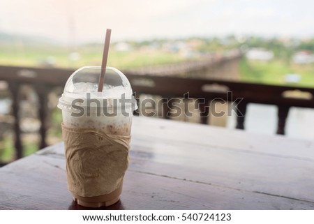 Cool coffee with blur background