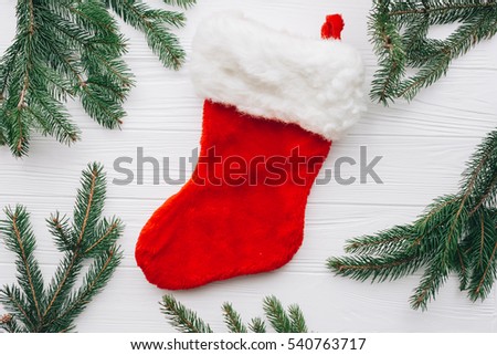 Christmas decorations, Christmas red sock on a white wooden background