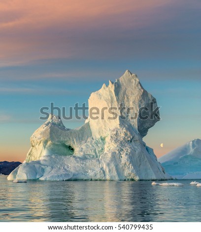 Huge icebergs of different forms in the Disco Bay, Greenland. Their source is by the Jakobshavn glacier. This is a consequence of the phenomenon of global warming and catastrophic thawing of ice 