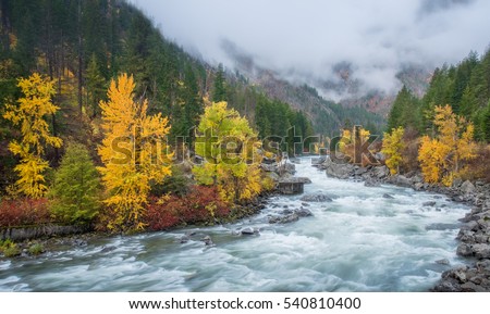 River in Leavenworth , washington, Autumn HDR with fog over the mountain in background