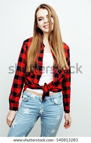young pretty stylish hipster teen blond girl posing emotional isolated on white background happy smiling cool smile, lifestyle people concept