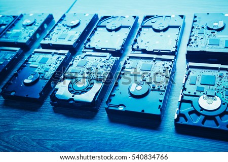hard disk drives in a rows, blue tone