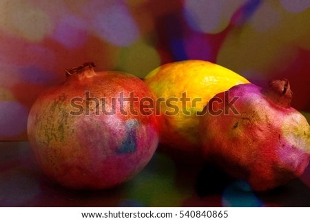 Arranged delicious exotic fruits still life on dark background. Tropical pomegranate and papaya composing, selective focus, fruit business cooking concept, magazines receipes. Image with filter effect