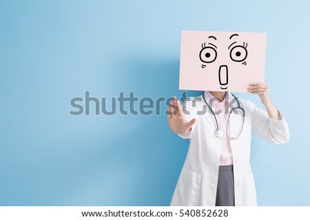woman doctor take surprise billboard and show stop ,asian