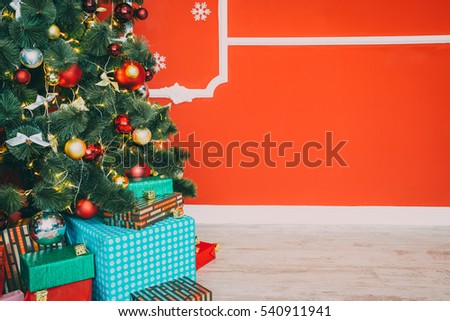Beautiful Christmas living room with decorated Christmas tree, gifts