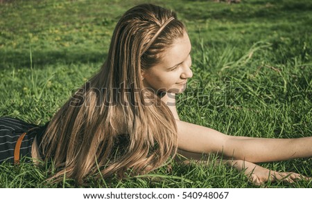 girl on green field