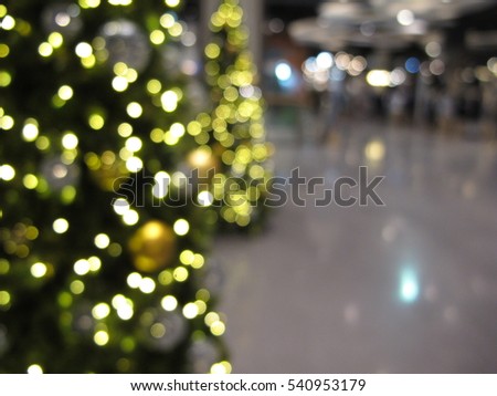 Christmas tree decoration interior in Shopping mall, abstract blur background