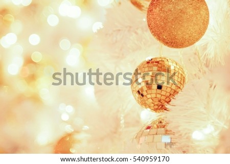 Blurred bokeh of  golden Christmas ball