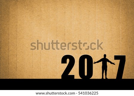 Freedom Man in 2017 number of happy new year on Brown paper background