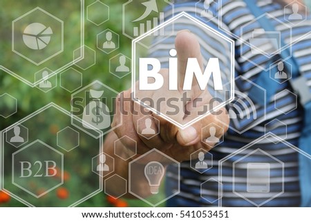 Farmer businessman push button icon  BIM, building information modeling on the touch screen in the web network .Tanned hands, male hands of an elderly person . 