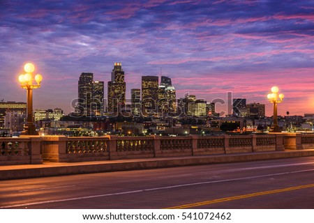 Skyscrapers in downtown Los Angeles California at sunset. View from bridge