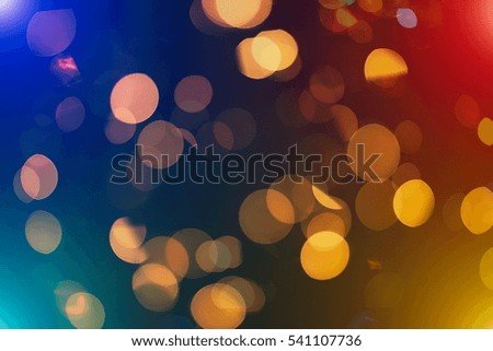 abstract blurred of blue and silver glittering shine bulbs lights background:blur of Christmas wallpaper decorations concept.xmas holiday festival backdrop:sparkle circle lit celebrations display.