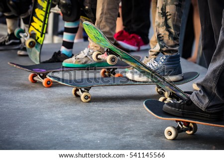 A skateboarder in action at Venice Beach Skate Park in Los Angeles, California, USA Royalty-Free Stock Photo #541145566