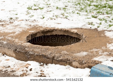 open sewer manhole