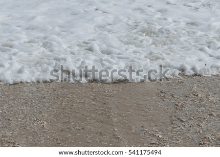 Waves lapping at the beach