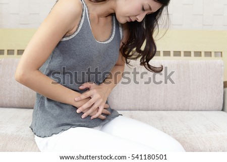 Woman who has a stomachache