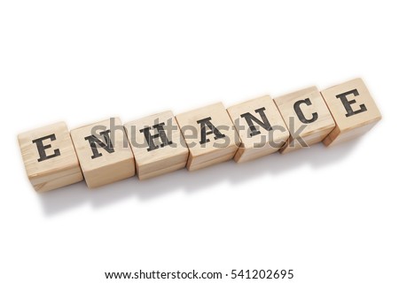 ENHANCE word made with building blocks isolated on white